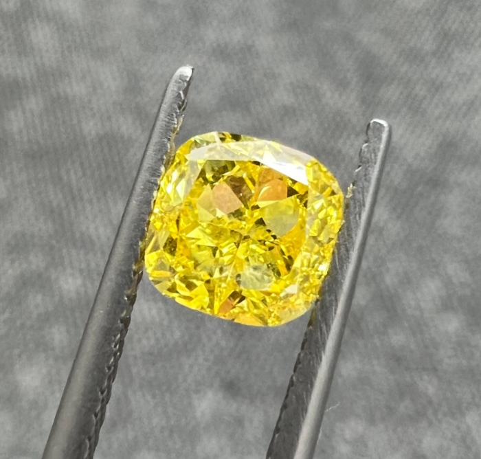 Loose calibrated diamonds, 6.20 mm * 6.14 mm, color Fancy Vivid Yellow,...